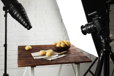 Photo of Shooting food in photo studio with professional lighting equipment