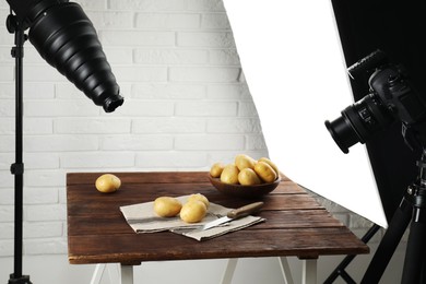 Photo of Shooting food in photo studio with professional lighting equipment