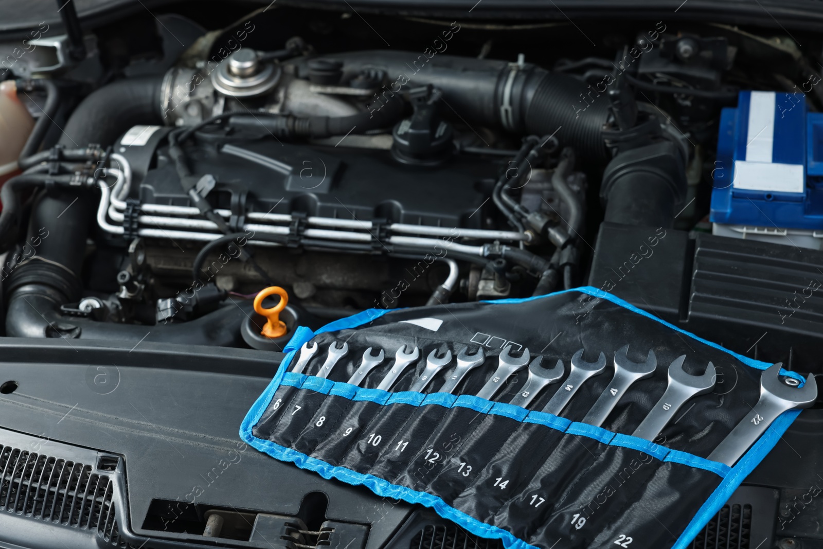 Photo of Set of different auto mechanic's tools at automobile repair shop