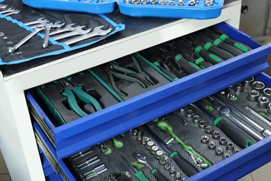 Photo of Set of different auto mechanic's tools, closeup