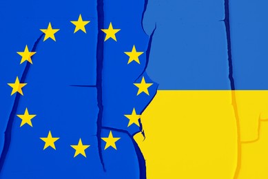 Image of Flags of European Union and Ukraine on wall