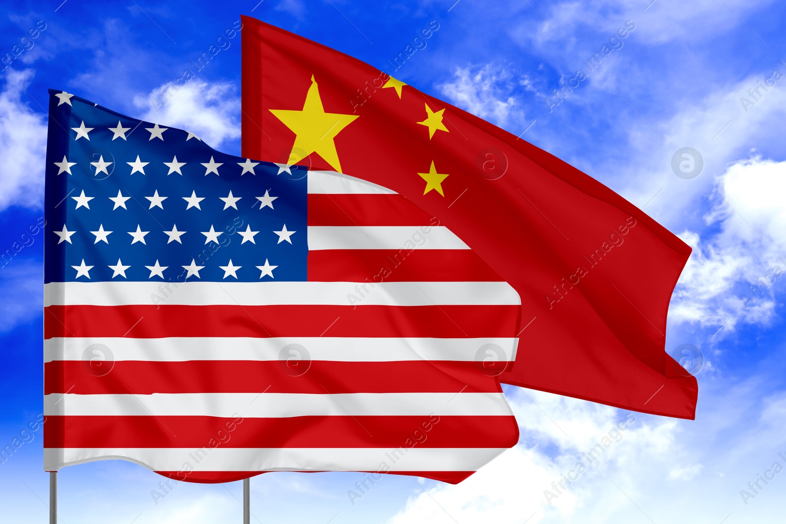 Image of Flags of USA and China against sky. Diplomatic international relations