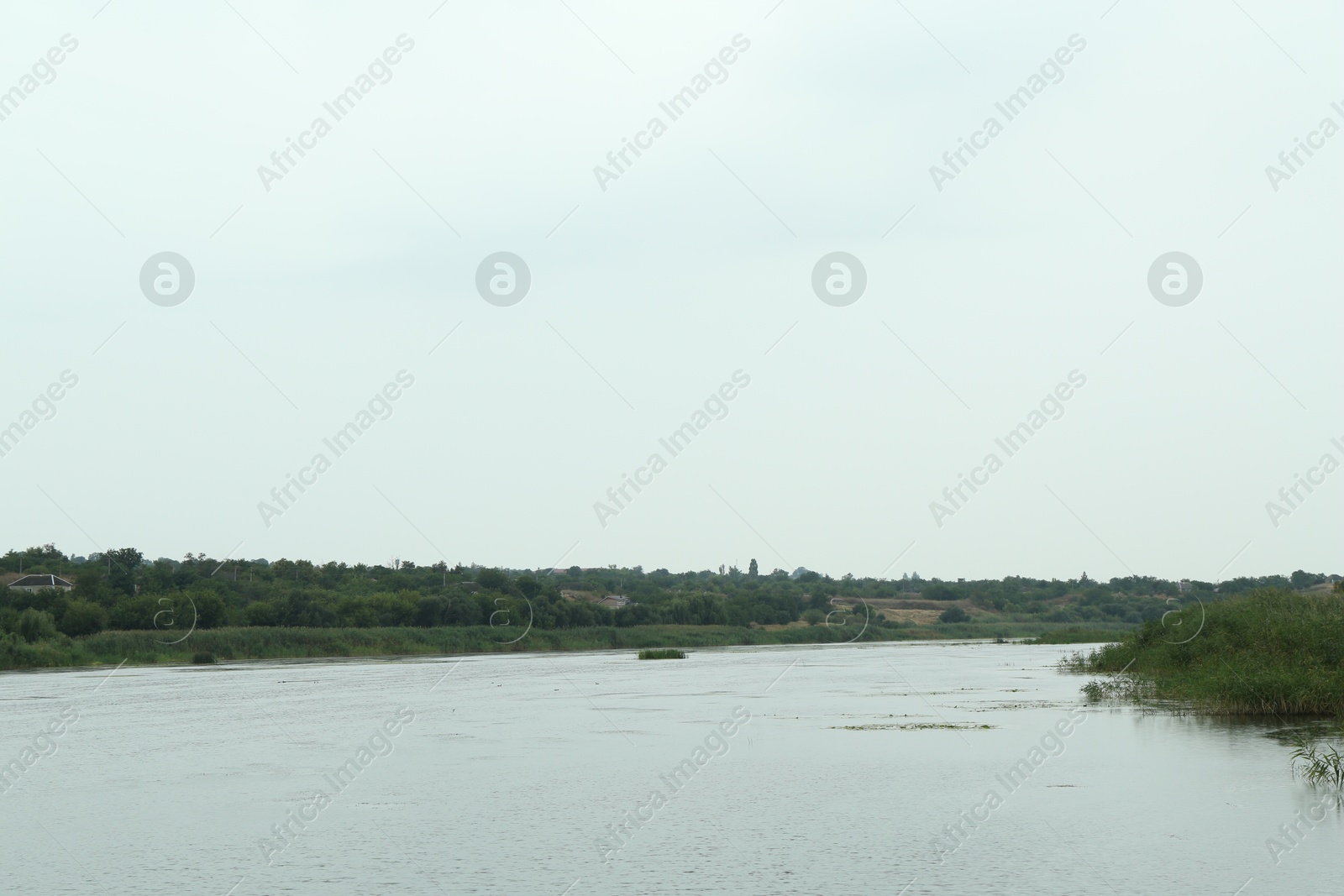 Photo of Picturesque view of lake on cloudy day outdoors