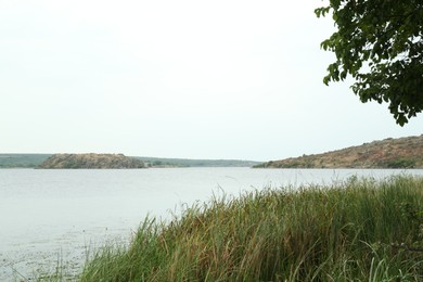 Picturesque view of lake on cloudy day outdoors