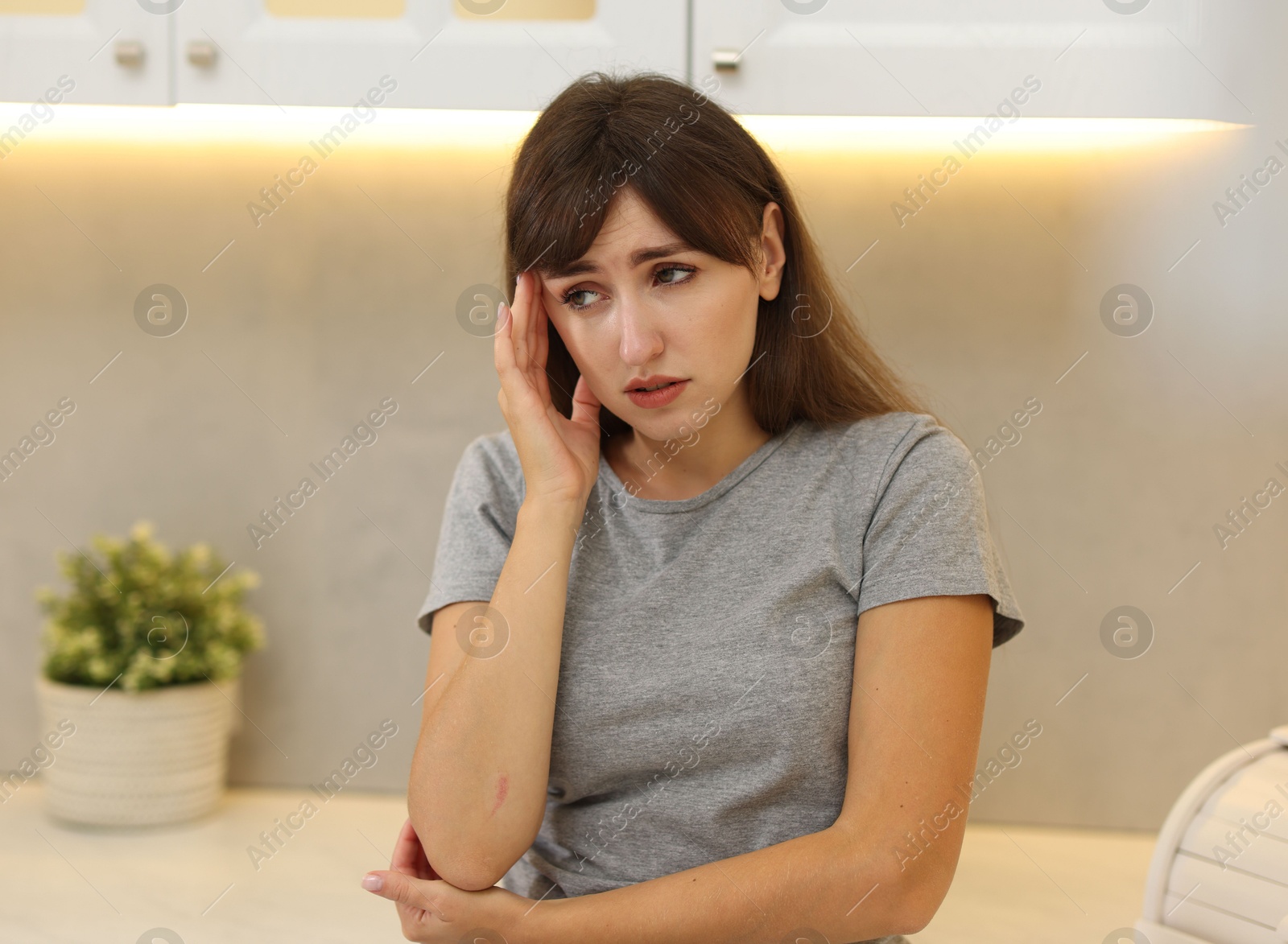 Photo of Tired woman suffering from sinusitis at home