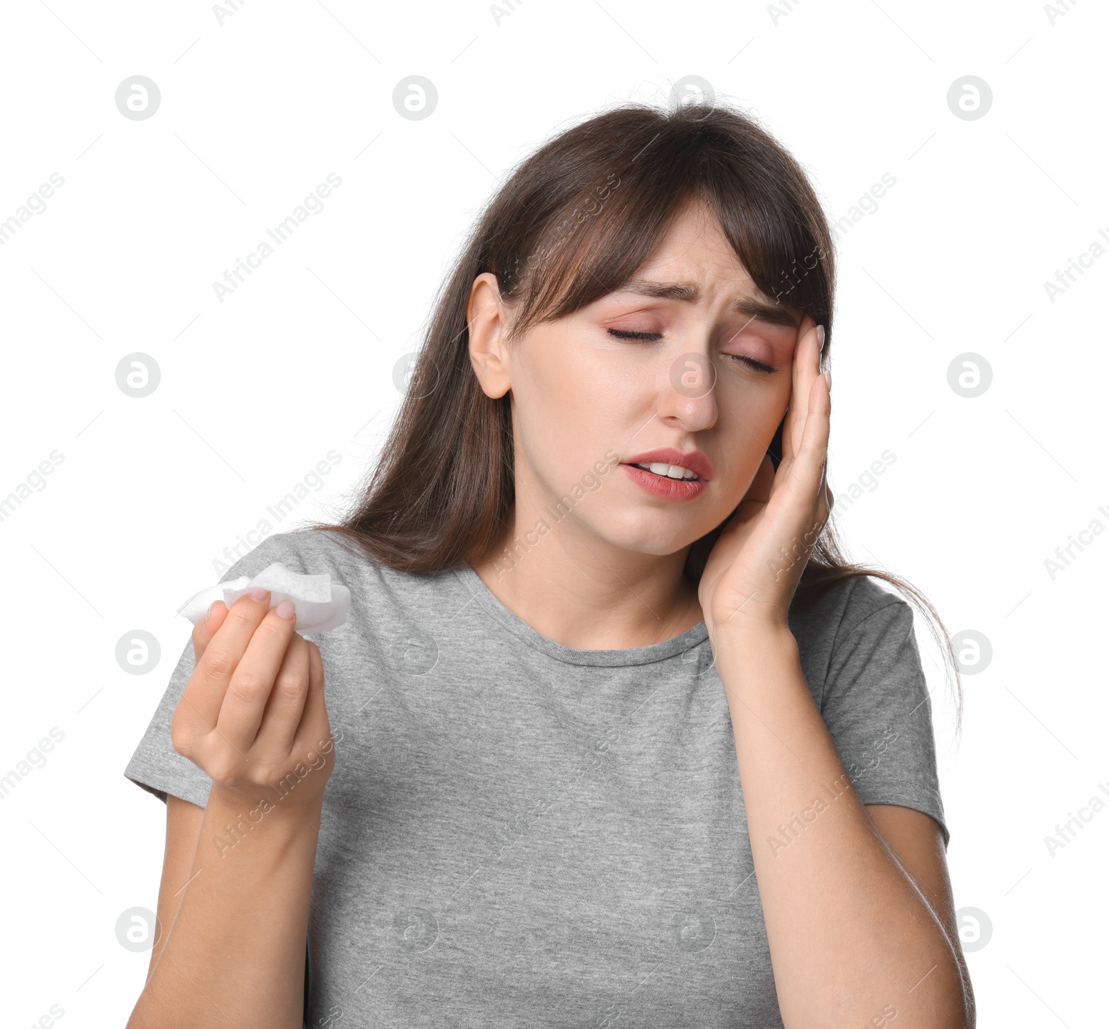 Photo of Woman with napkin suffering from sinusitis on white background