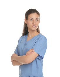 Portrait of beautiful nurse with crossed arms on white background