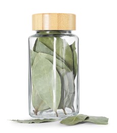 Photo of Dry bay leaves in glass jar isolated on white