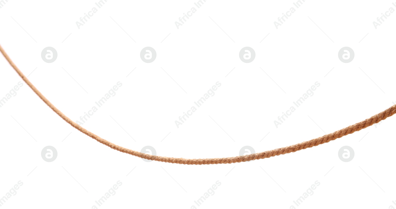 Photo of One brown braided rope isolated on white