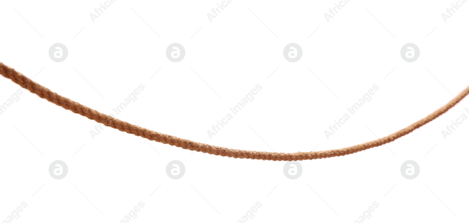 Photo of One brown braided rope isolated on white