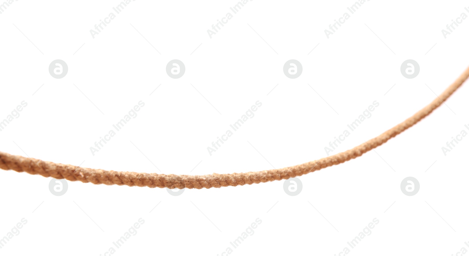 Photo of One brown braided rope isolated on white