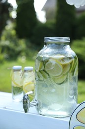 Photo of Lemonade stand with refreshing drink in park