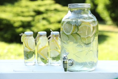 Lemonade stand with refreshing drink in park