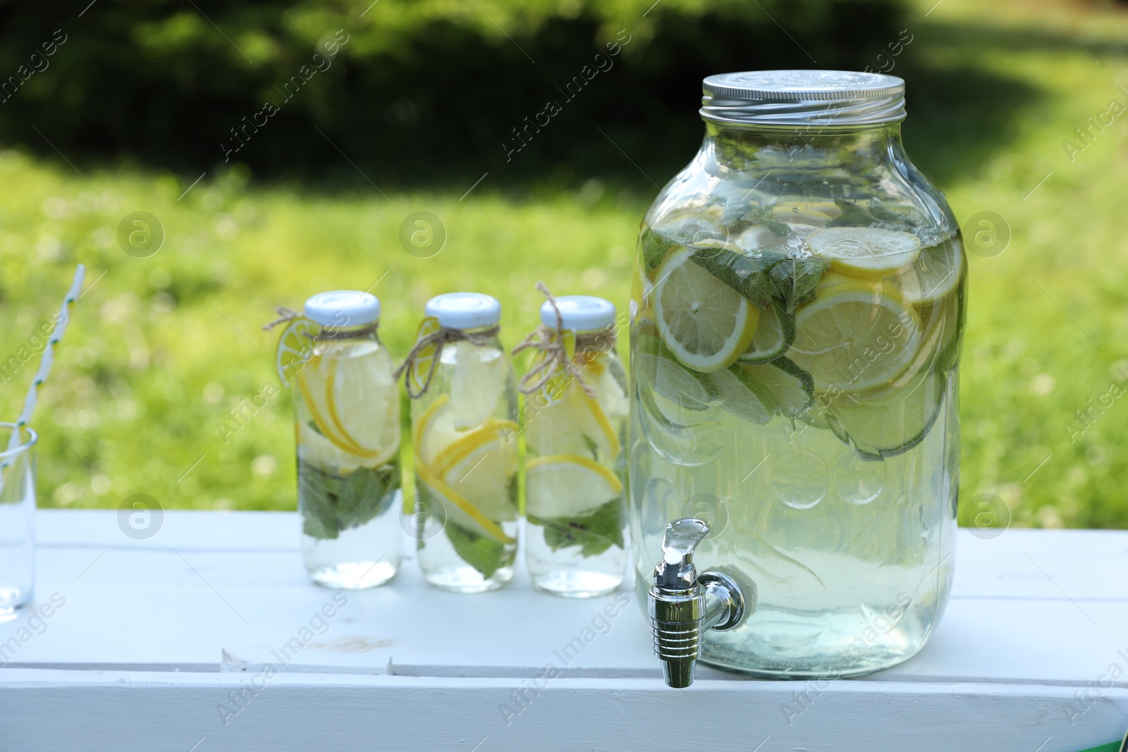 Photo of Lemonade stand with refreshing drink in park