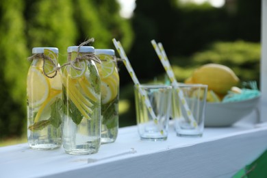 Lemonade stand with refreshing drink in park