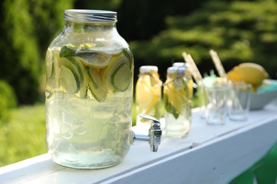 Photo of Lemonade stand with refreshing drink in park