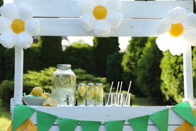 Photo of Lemonade stand with refreshing drink in park