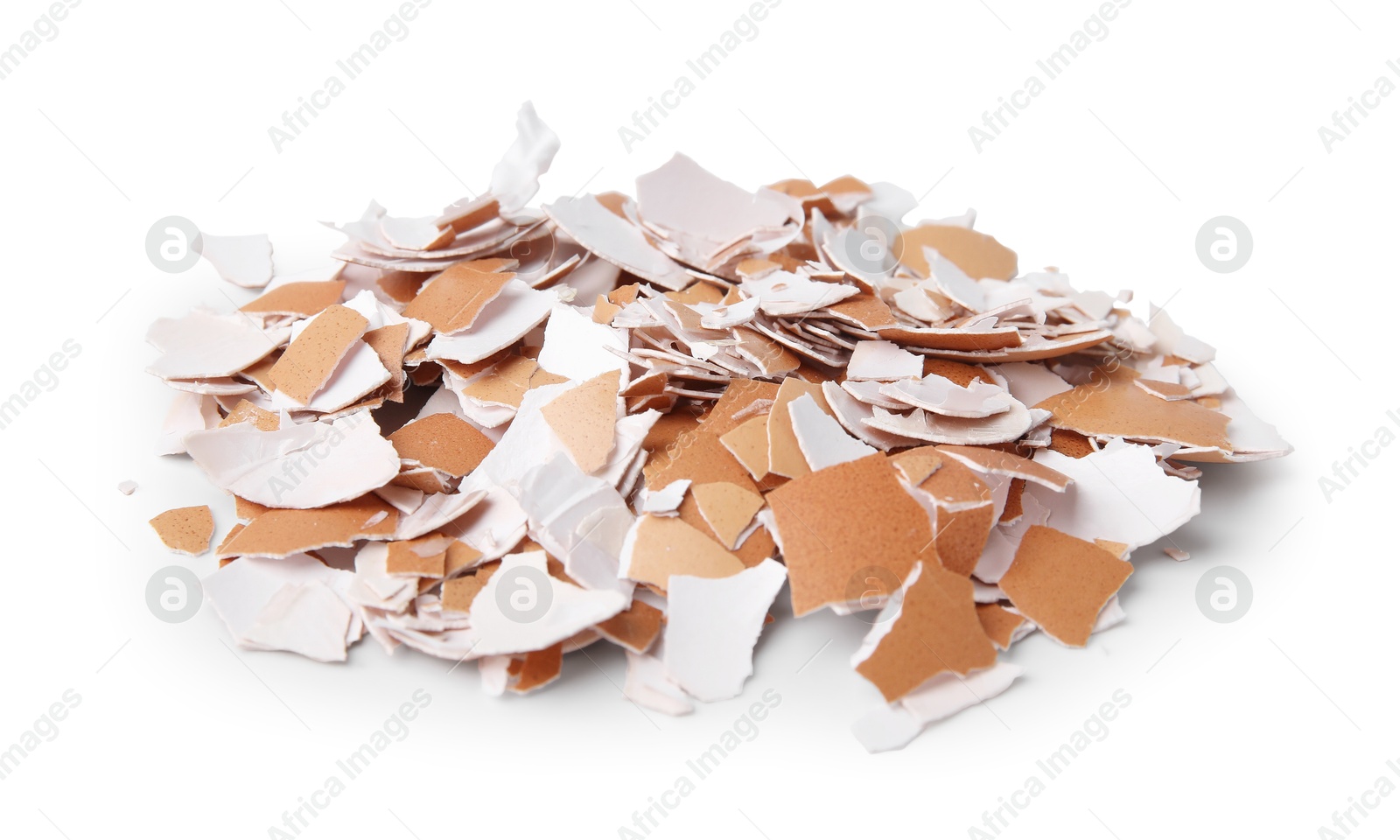 Photo of Pile of broken eggshells isolated on white