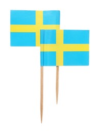 Photo of Small paper flags of Sweden isolated on white