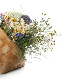 Beautiful wildflowers in bag isolated on white