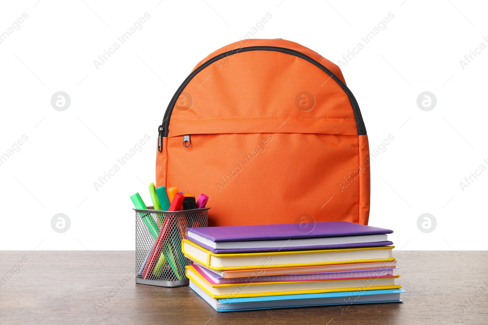 Photo of Backpack with different school stationery on wooden table against white background