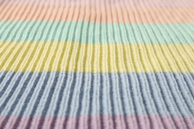 Texture of colorful knitted fabric as background, closeup