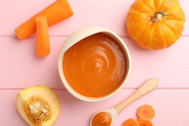 Photo of Delicious baby food in bowl and fresh ingredients on pink wooden table, flat lay