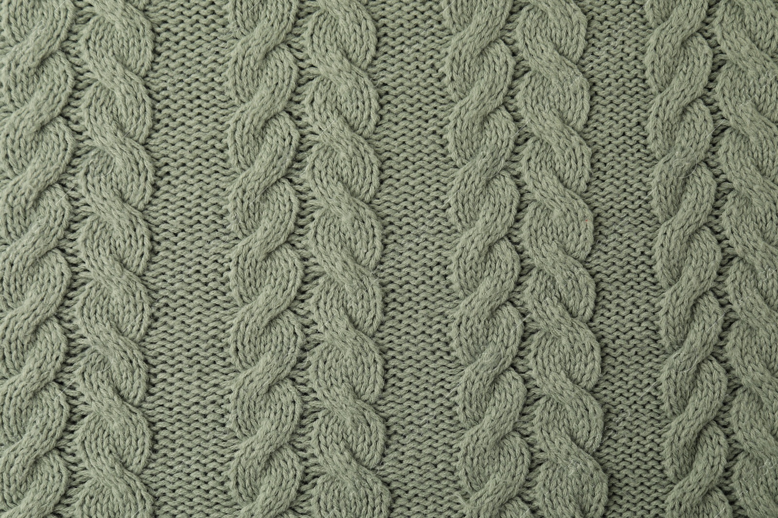 Photo of Texture of color knitted fabric as background, top view