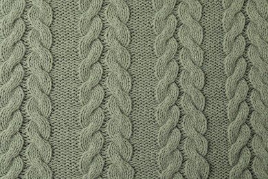 Texture of color knitted fabric as background, top view