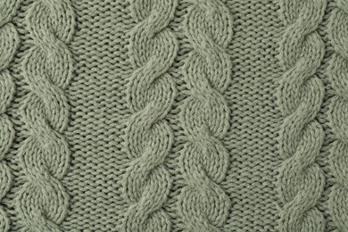 Photo of Texture of color knitted fabric as background, top view