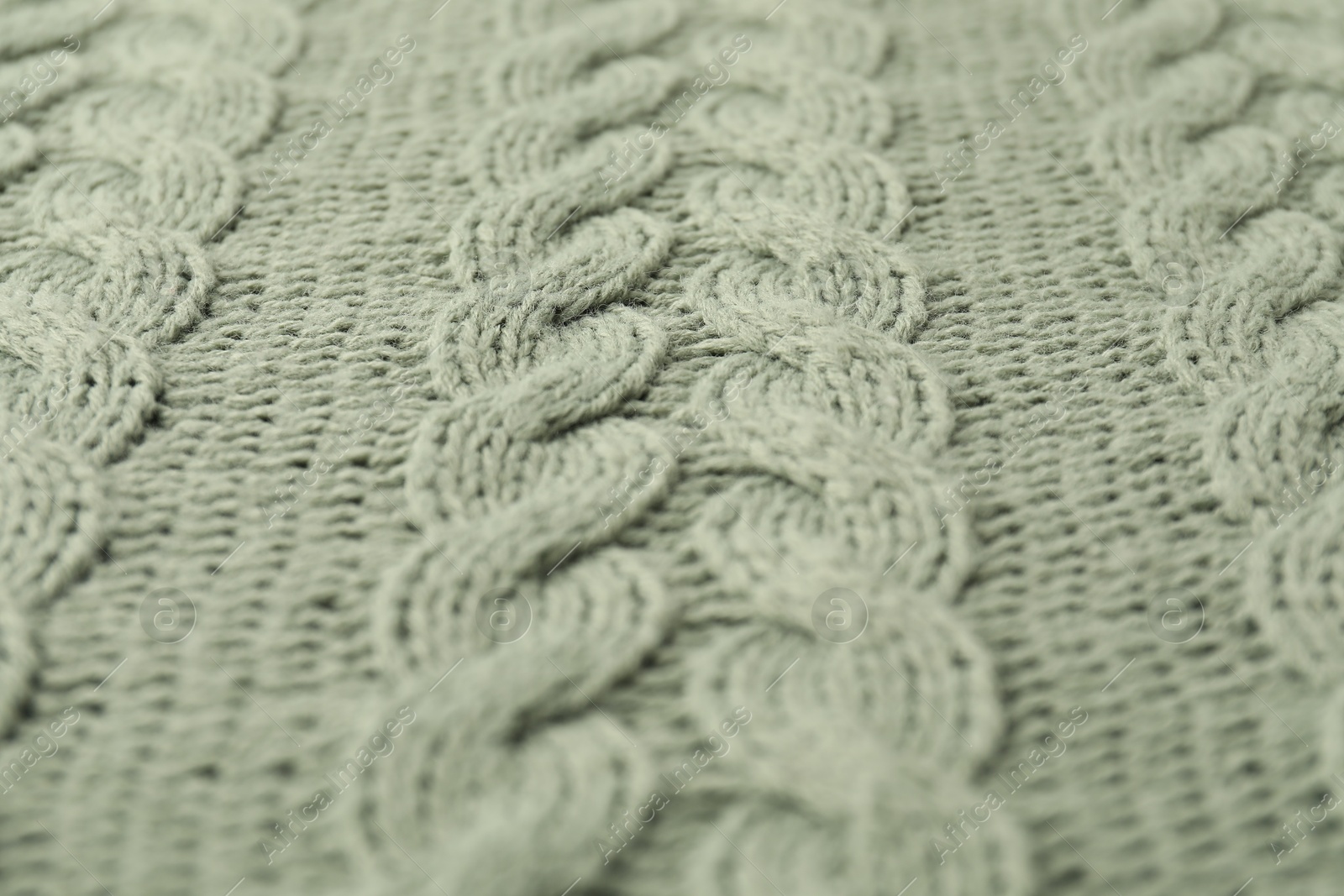 Photo of Texture of color knitted fabric as background, closeup