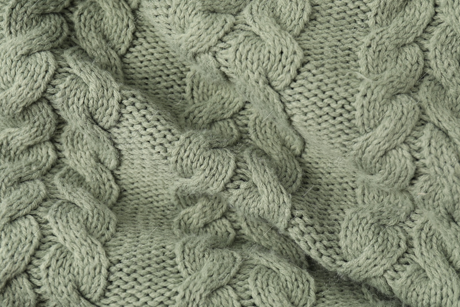 Photo of Texture of color knitted fabric as background, closeup