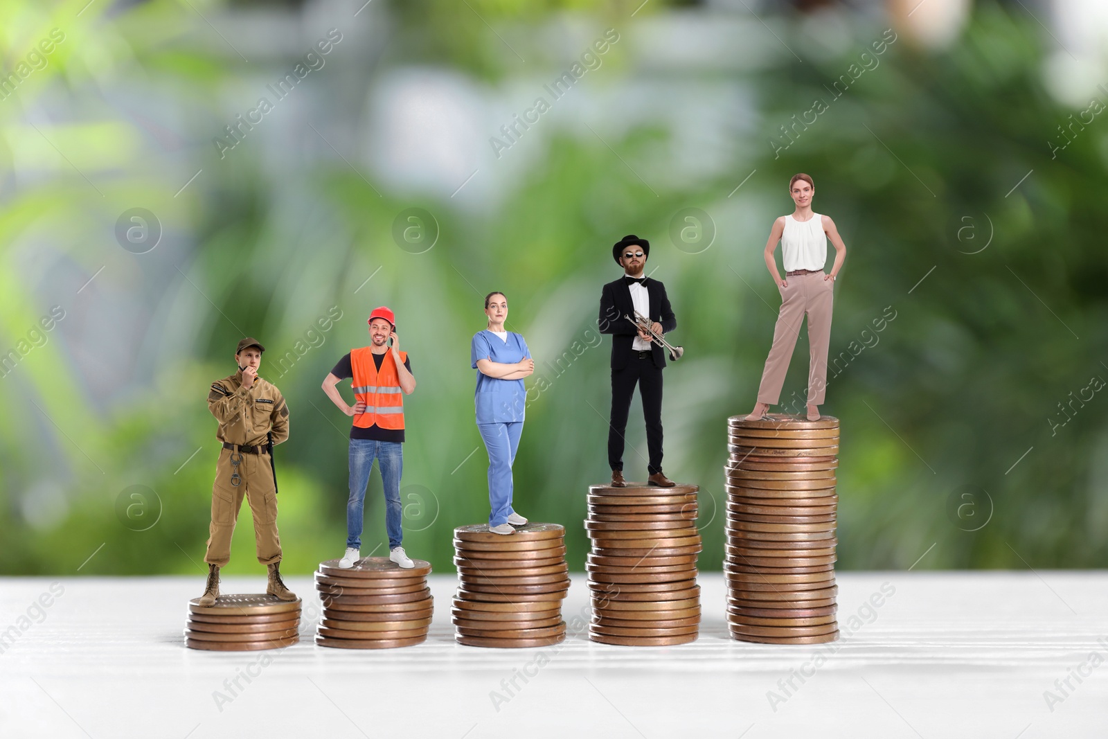 Image of People of various professions on stacks of coins of different height against blurred background