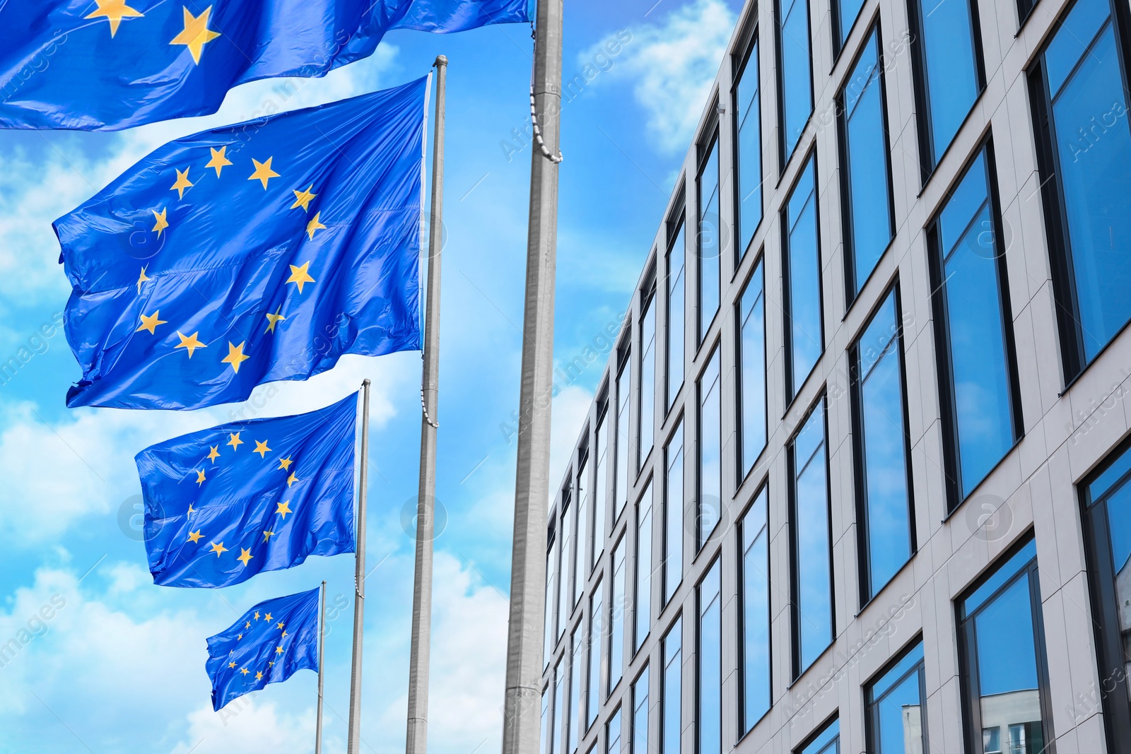 Image of Flags of European Union near building outdoors