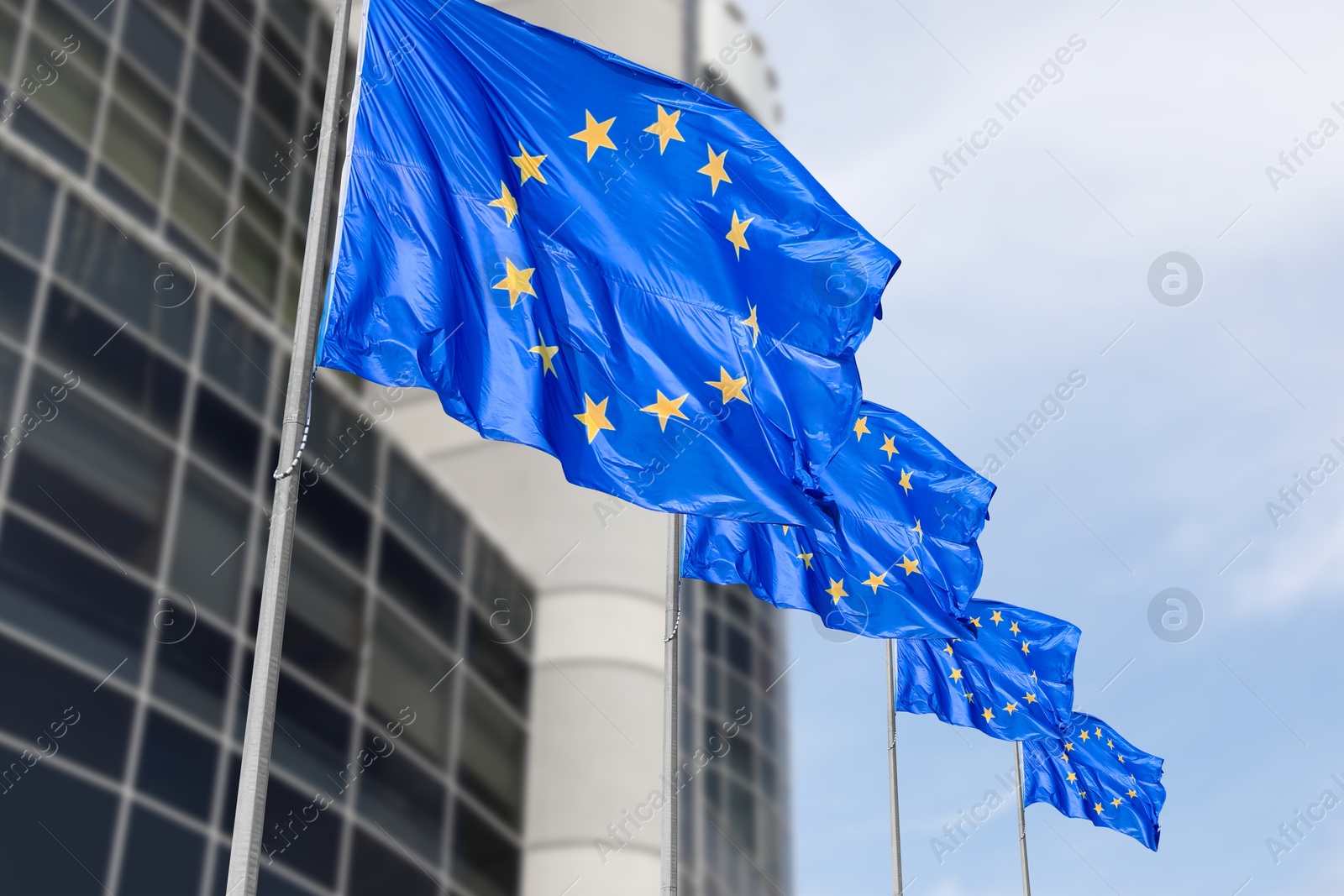 Image of Flags of European Union near building outdoors