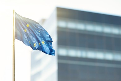 Flag of European Union near building outdoors