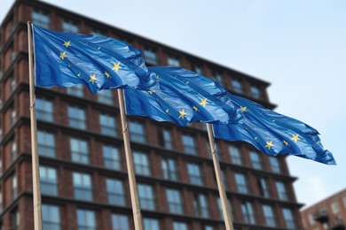 Image of Flags of European Union near building outdoors