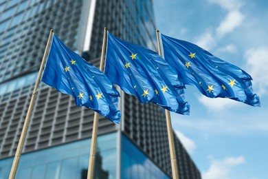 Image of Flags of European Union near building outdoors