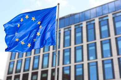 Flag of European Union near building outdoors