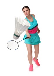 Image of Young woman playing badminton with racket and feather shuttlecock on white background