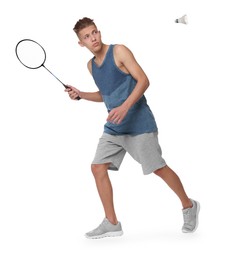 Image of Young man playing badminton with racket and feather shuttlecock on white background