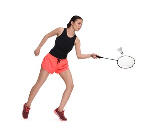 Young woman playing badminton with racket and feather shuttlecock on white background