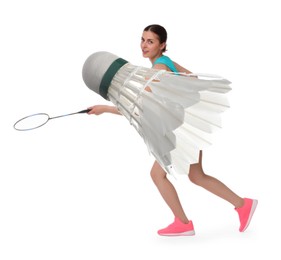 Image of Young woman playing badminton with racket and feather shuttlecock on white background