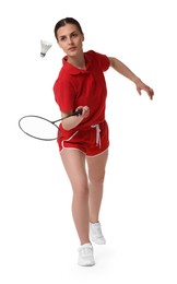 Image of Young woman playing badminton with racket and feather shuttlecock on white background