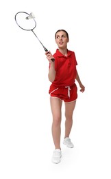 Image of Young woman playing badminton with racket and feather shuttlecock on white background