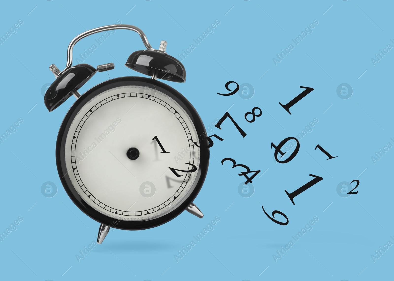 Image of Numbers flying away from alarm clock on light blue background. Time related concepts