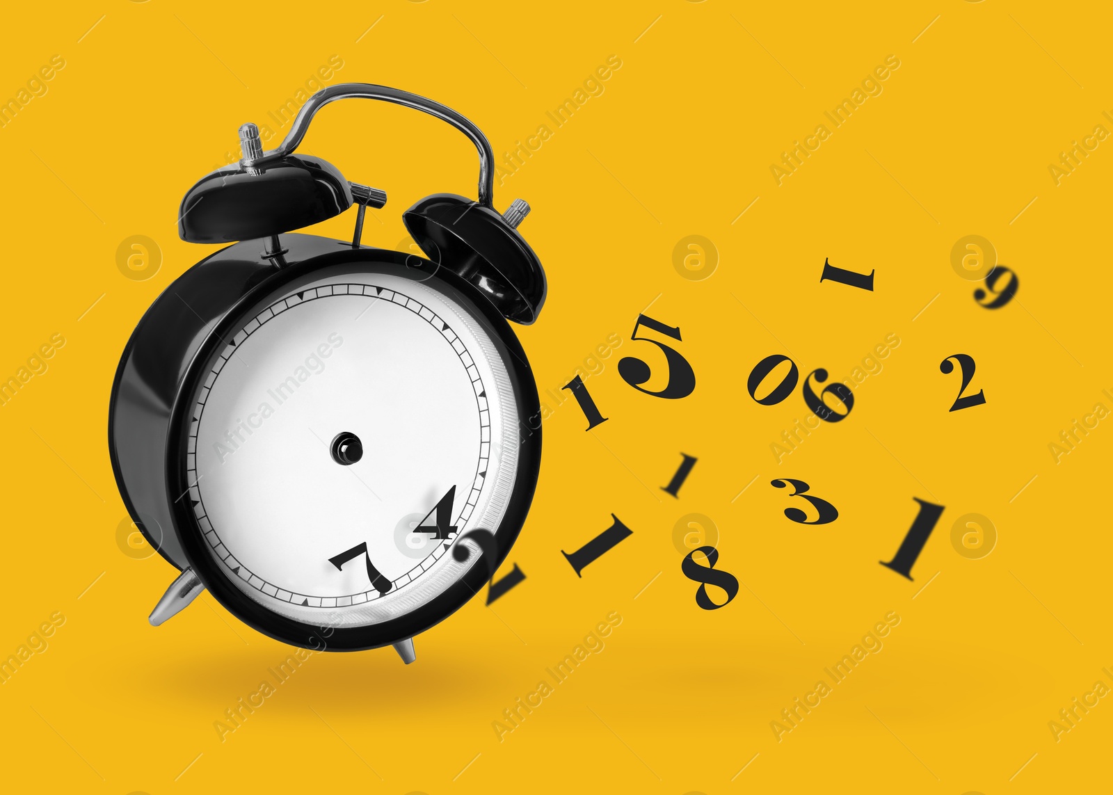 Image of Numbers flying away from alarm clock on orange background. Time related concepts