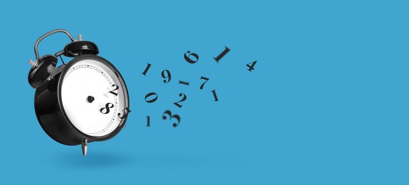 Image of Numbers flying away from alarm clock on light blue background, banner design with space for text. Time related concepts