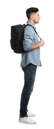 Man in casual clothes with backpack on white background