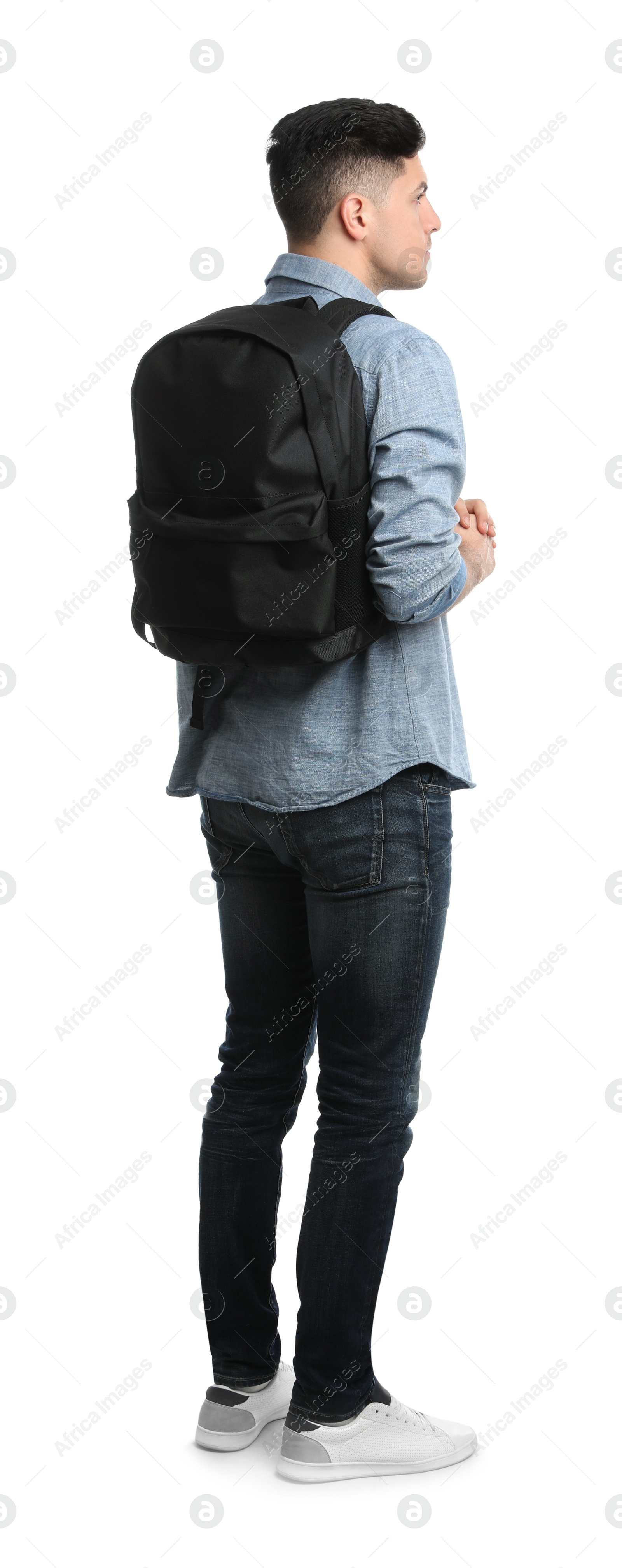 Photo of Man in casual clothes with backpack on white background, back view